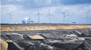  ?? EDITOR ALEN LEPAN ?? Wind turbines near the open-cast mining of German energy giant RWE in Garzweiler, western Germany, March 15, 2021.