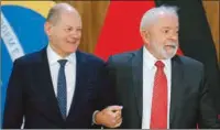  ?? (AFP) ?? Brazilian President Luiz Inacio Lula da Silva (right) and German Chancellor Olaf Scholz in Brasilia on Monday.