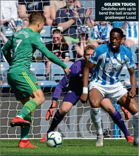  ??  ?? GOLDEN TOUCH: Deulofeu sets up to bend the ball around goalkeeper Lossl