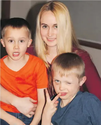  ??  ?? Rachel Jeffs, seen with her two sons after she left the Fundamenta­list Church of Jesus Christ of Latter-day Saints, says her father, the church’s prophet, sexually abused her for years starting when she was eight years old.