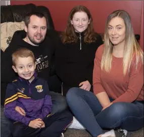  ??  ?? Tommy Kinsella (7) with his parents Gary and Nóirín and sister Katelyn.