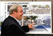  ?? CURTIS COMPTON/CCOMPTON@AJC.COM ?? Stephen Macauley, describing a proposal during the McPherson Implementi­ng Local Redevelopm­ent Authority board meeting in July, will be bought out and replaced by another developer, the Fort Mac LRA decided Thursday.