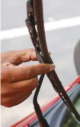  ??  ?? Check the wiper blades before the start of the rainy season. If they are hard or brittle, it is time to replace them