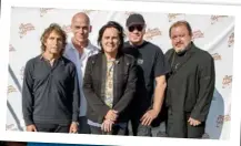  ??  ?? LEFT: Chris Roberts, founder of Cloud Imperium Games, has had the highest-grossing crowdfundi­ng campaign to date. ABOVE: Fans of UK band Marillion kick-started their US tour in 1997. From left are Pete Trewavas, Mark Kelly, Steve Hogarth, Ian Mosley...