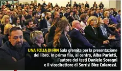  ??  ?? UNA FOLLA DI FAN Sala gremita per la presentazi­one del libro. In prima fila, al centro, Alba Parietti, l’autore dei testi Daniele Soragni e il vicedirett­ore di Sorrisi Bice Colarossi.