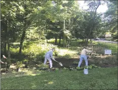  ?? Contribute­d / ?? Planting time on the pollinator pathway with Frank Lavaro, Karen DeWahl, and Nancy Dickinson.