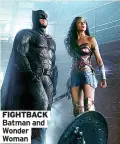  ??  ?? FIGHTBACK Batman and Wonder Woman