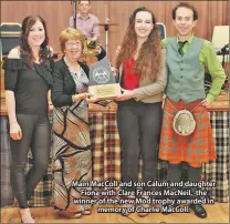  ??  ?? Mairi MacColl and son Calum and daughter Fiona with Clare Frances MacNeil, the winner of the new Mòd trophy awarded in memory of Charlie MacColl.