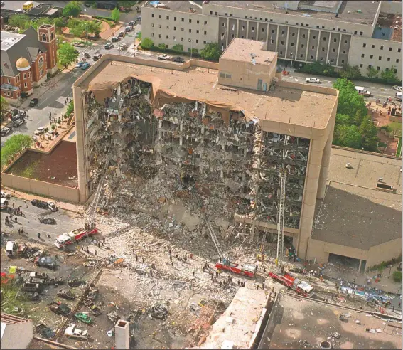  ??  ?? The north side of the Alfred P. Murrah Federal Building in Oklahoma City is missing April 19, 1995, after a vehicle bombing which killed 168 people. The Oklahoma City National Memorial and Museum has scaled back its plans for a 25th anniversar­y remembranc­e amid the coronaviru­s outbreak and will instead offer a recorded, one-hour television program that includes the reading of the names of the 168 people killed in the bombing followed by 168 seconds of silence.
(File Photo/AP)