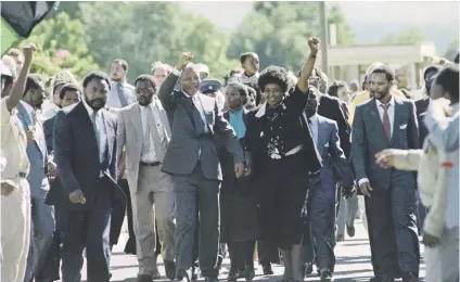  ?? Picture: AFP ?? FREE AT LAST. On February 11, 1990, anti-apartheid leader and ANC member Nelson Mandela and his wife ,Winnie, raise fists upon his release from Victor Verster prison in Paarl.
