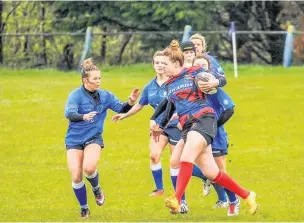  ??  ?? Naomi in action on the rugby pitch