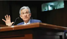  ?? ALEX WONG / GETTY IMAGES ?? Federal Reserve Chairman Jerome Powell said that the Fed’s plan for raising rates slowly is “running smoothly.” “Our policies reflect the strong performanc­e of the economy and are intended to help make sure that this trend continues,” he explained.