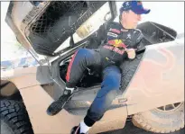  ?? Picture: AFP ?? OUT: Peugeot’s Carlos Sainz leaves his carat at the end of stage two of the 2017 Dakar Rally. Sainz has been forced to withdraw from the race