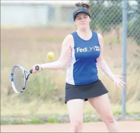  ?? Pictures: Megan Fisher ?? In form: McEwen Reserve Opal’s Sam Exell hits this one with the middle of the racquet.