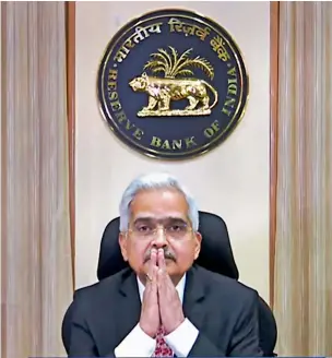  ?? ?? Reserve Bank of India Governor Shaktikant­a Das DIGITALLY DELIVERS A STATEMENT ABOUT THE MONETARY POLICY COMMITTEE’S DECISION TO RAISE ITS KEY INTEREST RATE TO 4.4 PER CENT FROM FOUR PER CENT IN A SURPRISE MOVE TO CONTAIN INFLATION. — pti