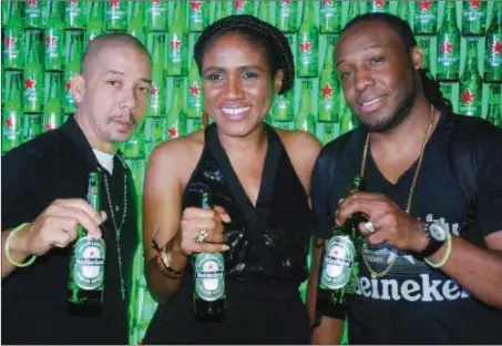  ?? sunday adigun ?? HEINEKEN PARTY L-R:Disk Jockey (DJ) Robert Anthony; Senior Brand Manager, Heineken, Ngozi Nwoji; and DJ, Richard Damian, at the Heineken Green Light Party in Lagos...recently