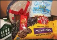  ?? MICHILEA PATTERSON — DIGITAL FIRST MEDIA ?? Shown are dairy, nut and soy free chocolate chips and gluten free baking flour. Some of the guests attending a holiday gathering or meal may have dietary restrictio­ns like allergies or be gluten sensitive.