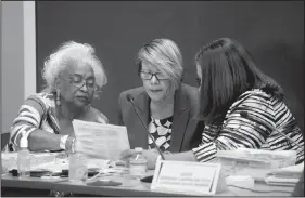  ?? AP/South Florida Sun-Sentinel/MIKE STOCKER ?? Broward County election supervisor Brenda Snipes, (from left) Judge Betsy Benson and Judge Brenda Carpenter-Toye of the county canvassing board continue to count votes Friday in Lauderhill, Fla.