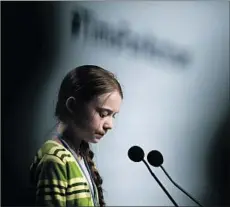  ?? CRISTINA QUICLER AFP via Getty Images ?? SWEDISH CLIMATE activist Greta Thunberg in Madrid. Green groups and some nations still opppose trading pollution allowances.
