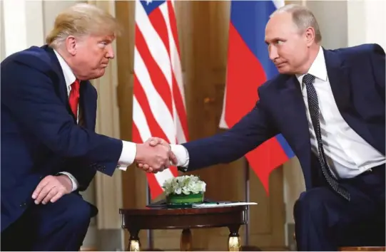  ?? FOTO: NTB SCANPIX ?? HEMMELIGE: President Donald Trump (t.v.) har sørget for at det ikke foreligger referater fra de fem møtene han så langt har hatt med Russland president Vladimir Putin (t.h.).