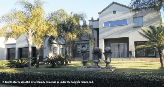  ??  ?? A double-storey Woodhill Estate family home will go under the hammer month-end.