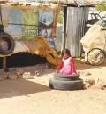  ?? (Heba Kanso/Thompson Reuters Foundation) ?? ONE OF ABDALLAH’S children plays outside the family’s makeshift tent in Lebanon’s Bekaa Valley last month.