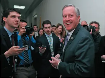  ?? AP PHOTO ?? House Freedom Caucus Chairman Rep. Mark Meadows, R-N.C. smiles as he speaks with the media on Capitol Hill in Washington on Thursday, following a Freedom Caucus meeting.