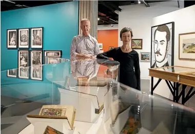  ?? ROSS GIBLIN/STUFF ?? Curators Peter Ireland and Fiona Oliver hope the public will find things that spark a sense of wonder at Alexander Turnbull Library.