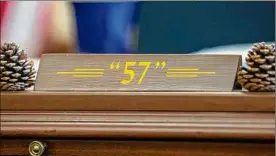  ?? ?? The nameplate on Gov. Kathy Hochul’s desk signifies that she is the 57th governor of New York. She is the first woman to hold the office.