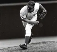  ?? AP 1978 ?? Cincinnati Reds pitcher TomSeaverw­atches a pitch to a St. Louis Cardinals batter on hisway to a no-hitter in a baseball game in Cincinnati. Seaver has died.