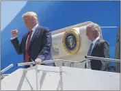  ?? ALEX BRANDON — THE ASSOCIATED PRESS FILE ?? On June 11, President Donald Trump gestures as he steps off Air Force One at Dallas Love Field in Dallas with Senate candidate Tommy Tuberville.