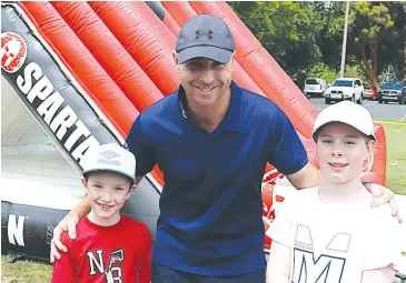  ??  ?? Lochie, Allan and Ella Chandler enjoy some time at the Spartan Kids course.