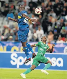  ?? Picture: GALLO IMAGES/CARL FOURIE ?? HIGH ACTION: Kwanda Mngonyama of Cape Town City FC and Talent Chawaphiwa of Baroka FC during their Premier League match at Cape Town Stadium on Saturday. The match ended in a 2-2 draw.