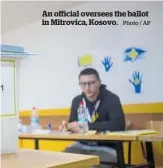  ?? Photo / AP ?? An official oversees the ballot in Mitrovica, Kosovo.