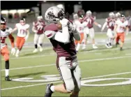  ?? Bud Sullins/Special to the Herald-Leader ?? Siloam Springs junior Tanner Broyles hauls in a 20-yard catch last Friday against Russellvil­le.