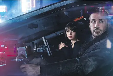  ?? — WARNER BROS. ?? Ana de Armas and Ryan Gosling explore questions of selfhood in Blade Runner 2049.