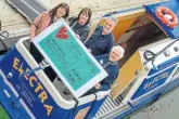  ?? ?? Elaine Wales of the John Lewis
Partnershi­p, left, presenting a cheque to Electra’s lead cabin host James Clifton and volunteer chair Jane Wolfson with, second left, Laura Few from Flowers House.