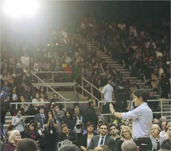  ?? DAVE CHIDLEY / THE CANADIAN PRESS ?? Prime Minister Justin Trudeau speaks during a town hall meeting at Western University n London, Ont., last week. The two- day swing through Ontario was part of a national “listening tour” hastily put together by the Prime Minister’s Office.