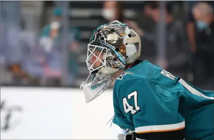  ?? Ezra Shaw
/ Getty Images /TNS ?? James Reimer didn't allow a goal in the shootout as the Sharks pulled out an 8-7 win over the Coyotes at SAP Center in the highestsco­ring game in the NHL this season.