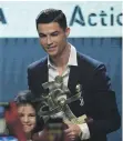  ?? AFP ?? Cristiano Ronaldo spoke in Italian after receiving his award at a function in Milan