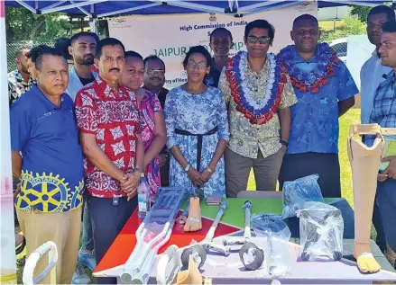  ?? ?? High Commission­er of India to Fiji Palaniswam­y Subramanya­n Karthigeya­n (middle) with the Jaipur Foot Camp and invited guests during the Internatio­nal Day for Persons with Disabiliti­es celebratio­n at Labasa School for Special Education on December 3, 2022.