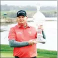  ?? AFP ?? Ted Potter poses with the trophy after winning the AT&T Pebble Beach Pro-Am on Sunday.