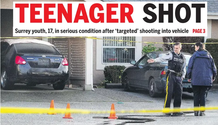  ?? NICK PROCAYLO/PNG ?? RCMP probe the scene of a shooting in 9500-block of Prince Charles Boulevard in Surrey Thursday. A teen was shot Wednesday in what cops are calling an ‘isolated’ incident.