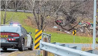  ?? BOB TYMCZYSZYN TORSTAR ?? Crews were cleaning up some of the encampment­s by Highway 406 and Geneva Street Thursday. Cleanups there and on Ontario Power Generation property continued Friday.