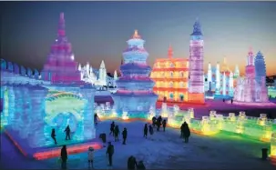  ?? WANG JIANWEI / XINHUA ?? Tourists visit the Harbin Ice and Snow World, a theme park in northeast China’s Heilongjia­ng province, in December.