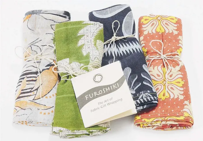  ?? TEN THOUSAND VILLAGES ?? Gift wrap made from saris that are recycled by artisans in Bangladesh. The company says sales have been growing steadily since the wraps were introduced in 2013.