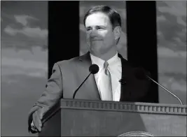  ?? ASSOCIATED PRESS ?? ARIZONA GOV. DOUG DUCEY LOOKS ON DURING A SPEECH after being sworn in for his second term during his inaugurati­on ceremony at the state Capitol on Monday in Phoenix.