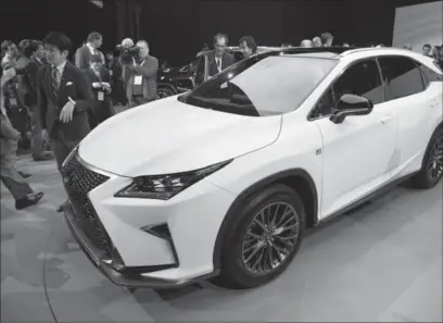  ?? KEVIN HAGEN, GETTY IMAGES ?? The new 2016 Lexus RX is displayed during press previews at the New York Internatio­nal Auto Show on Wednesday.