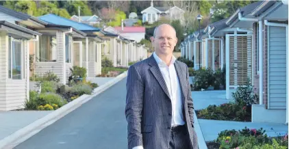  ?? PHOTO:ODT FILES ?? On target . . . Summerset chief executive Julian Cook at the opening of Summerset’s Bishopscou­rt retirement village in Dunedin in 2014.