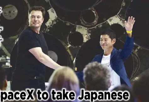  ?? AP ?? SpaceX founder and chief executive Elon Musk shakes hands with Japanese billionair­e Yusaku Maezawa after announcing him as the first private passenger on a trip around the moon in California on Monday.